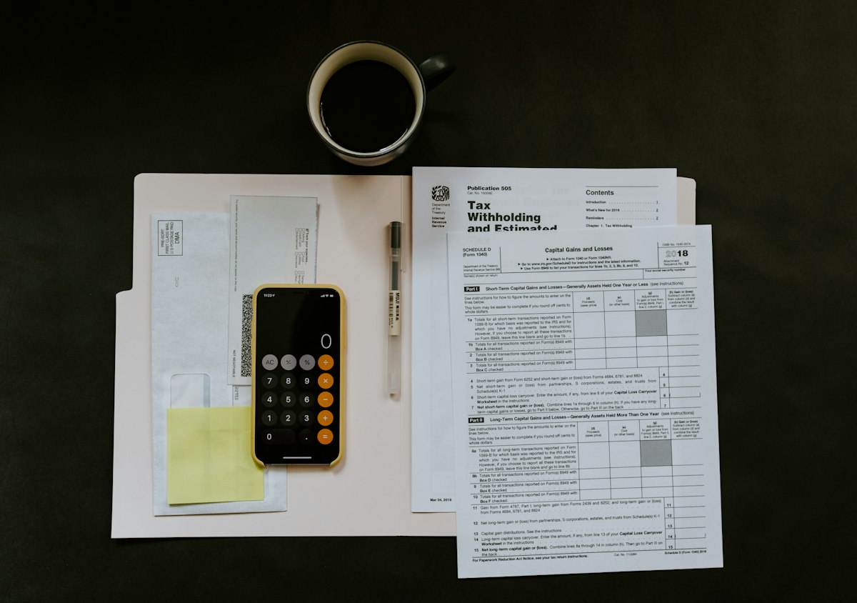 Calculator and notes used to review a loan budget