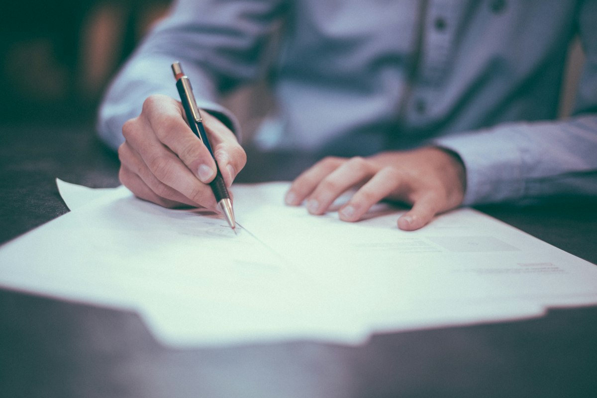 Loan documents being reviewed before signing