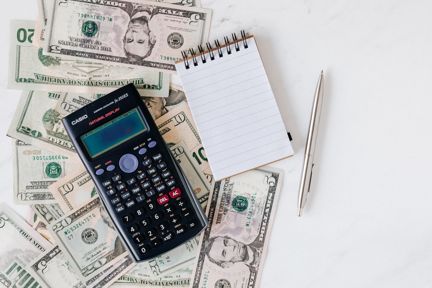 Calculator and bills on a desk